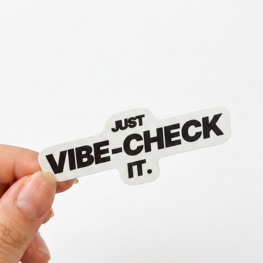 White corporate humor sticker with black text reading “Just vibe-check it.”