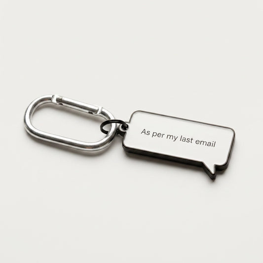 Keychain with a speech bubble design and text 'As per my last email' on a white background