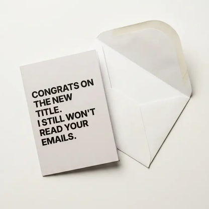 Greeting card with 'Congrats on the new title. I still won't read your emails' text on a white background