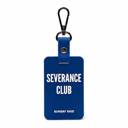 Blue Severance Club bag charm with bold white text. Funny corporate layoff gift and resilience keychain. Sunday Said silicone bag accessory.