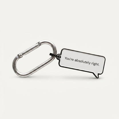 Keychain with a speech bubble saying 'You're absolutely right.' on a white background